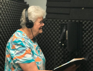 Chaplain Lynne Holden records the voiceover for our Memorial Day video.